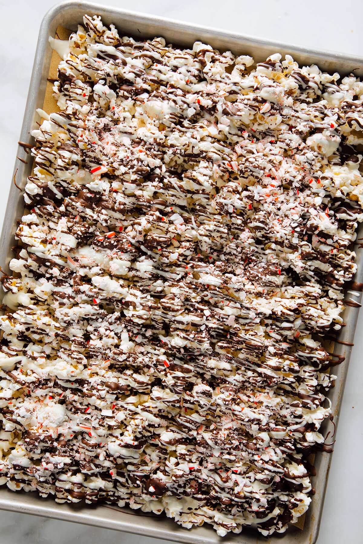 peppermint bark popcorn on pan