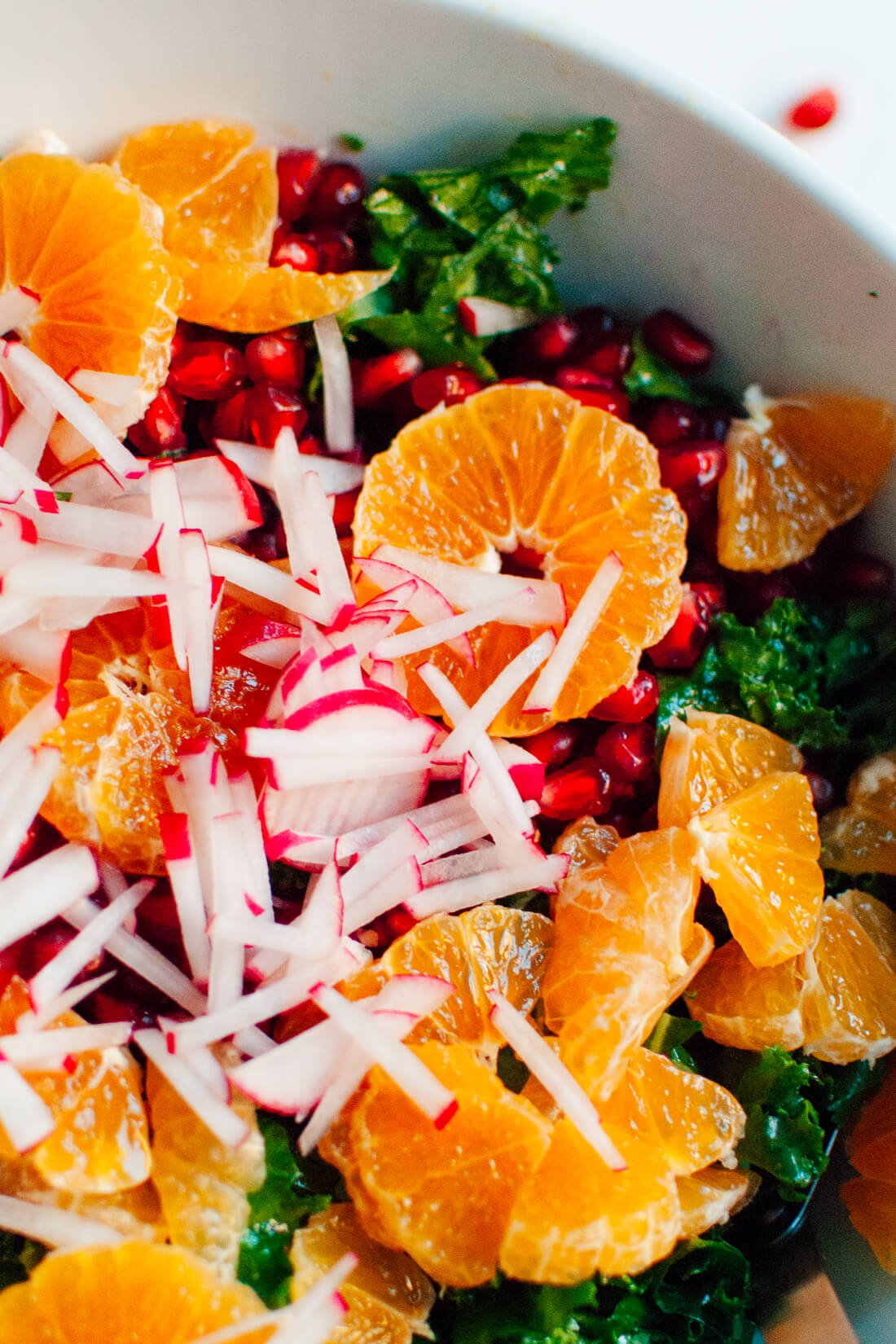 Radish, clementine, pomegranate and kale salad