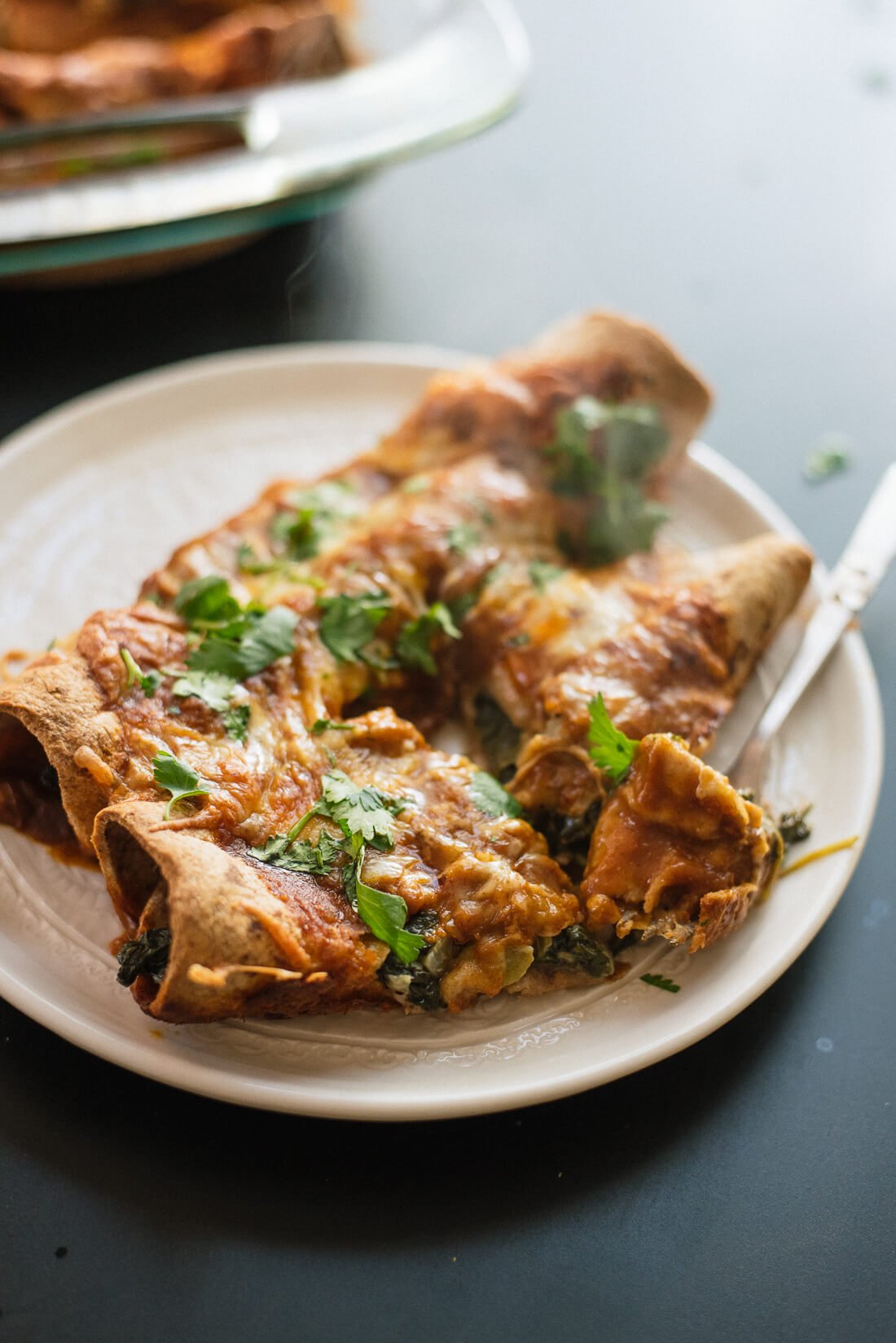 Vegetarian spinach enchiladas with artichoke, black beans and a simple homemade sauce