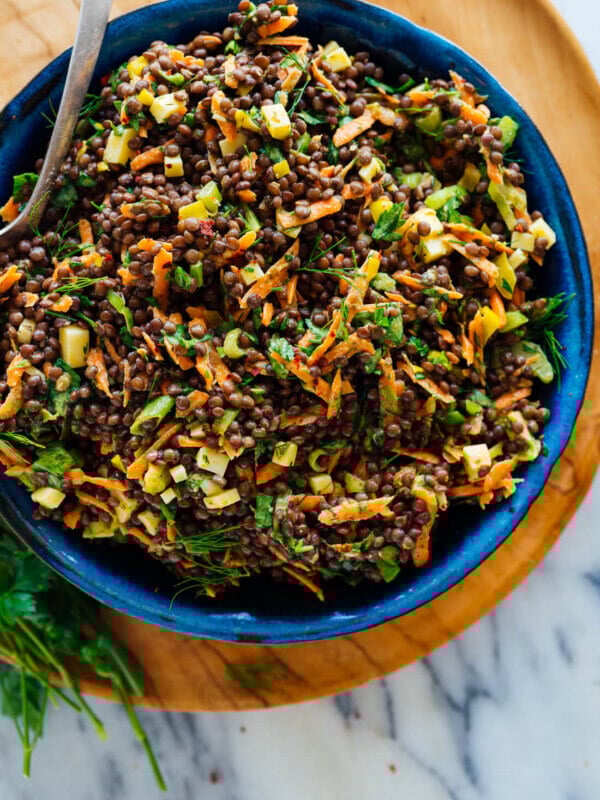 tangy lentil salad in blue bowl